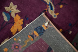 Antique Art Deco rug folded corner, showing violet bird pile and grey hand-knotted foundation.