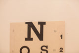 Vintage eye chart with letter 'N', number '1', 200 FT, and cut top edge.