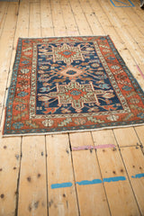 Vintage Karaja rug corner with madder root red serrated leaf border and fringe.