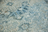 Vintage Distressed Mehrivan rug with even pile wear, revealing blue, beige, ivory motifs.