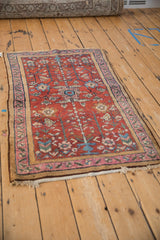 Antique Lilihan rug: double tree-of-life motif, asymmetric palmette, faded magenta, and camel border.