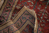 Antique Persian Lilihan rug's hand-knotted back, fringe, and patterned camel border.