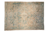 Distressed Heriz carpet, faded blue geometric medallions and neutral tones, 8'1