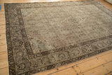 Vintage Bijar carpet corner, distressed Herati pattern and chocolate brown border.
