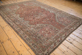 Vintage Kamseh carpet side with geometric borders in chestnut brown and time-softened silver tones.