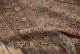 Hand-knotted vintage Kamseh carpet with even wear, madder root rust, and oxidized silver.