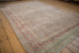 Distressed vintage Tabriz with muted Herati field and Samovar Turtle border details.