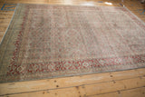 Vintage distressed Tabriz carpet with muted cherry red and powder blue Herati pattern.