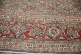 Distressed cherry red Samovar Turtle border and Herati pattern on vintage Persian Tabriz rug.