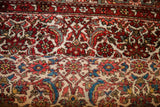 Persian Hamadan rug showcasing its pile's muted tones and the reverse side's vibrant blues, reds, and yellows.