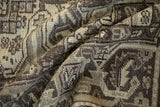 Distressed Mehrivan rug, textured pile, visible knot heads, beige and brown geometric patterns.