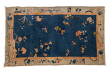 Antique Art Deco rug, cobalt blue field with botanical and butterfly motifs, ivory border, 4'2