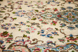 Vintage ivory Kerman rug with European-style curvilinear blue and pink floral motifs.