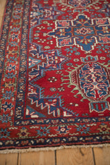 Finely woven wool pile showing the geometric palmette border of a vintage Karaja rug.