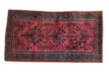 Circa 1930s vintage Persian Lilihan rug with magenta floral field and unique blue Serbend-style vine border.