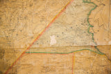 Time-softened patina and fine cartographic details on the canvas of an 1859 New York map.