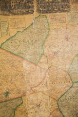Aged surface of an 1859 pull-down map showing creases and hand-colored county lines.