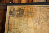 Detail of an inset illustration and aged, browned canvas on the antique New York county map.