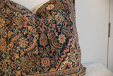 Antique Persian Fereghan pillow border with navy, terracotta, and saffron floral motifs.