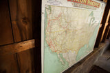 Angled detail of antique Union Pacific canvas map, western US routes and banner.