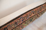 Late 19th century Fereghan rug fragment pillow, hand-knotted indigo, salmon, green pattern.