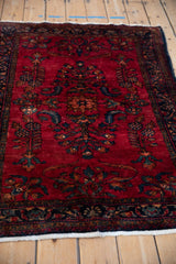Angled view of a fine Lilihan rug's soft, lustrous pile and curvilinear floral pattern.