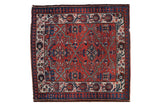 Vintage Malayer square rug with a brick red and indigo blue floral lattice design and pawn border.