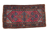 Vintage Mehriban rug with a stepped center medallion and scattered birds in raspberry red and denim blue.