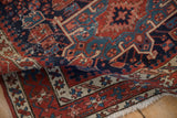 Folded border detail of antique Karaja rug: ivory, pawn motif, madder root red, and dark blue.