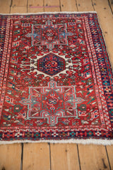 Karaja rug central hook and latch medallion, cherry red, sky blue geometric patterns.