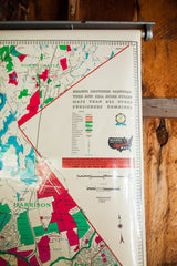 Hearne Brothers map with hot pink, aqua, ivory regions, legend, and industrial metal roller.