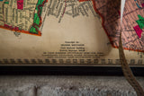 Vintage Hearne Brothers map copyright, numbered grid, and colorful street sections.