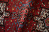 Close-up of a vintage Karaja rug showing the dense wool pile and visible hand-knotted structure.