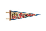 Vintage 1970s Jamaica felt pennant, bright blue and beige, with red lettering and national crest, 25x8.