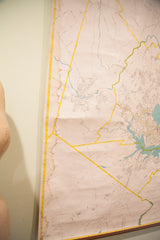 Pale vintage Portland Maine map detail, showing yellow lines and brown water damage.