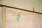 Upper right detail of vintage Portland Maine map, showing water damage and hanging strap.