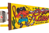 Close-up of the colorful cowboy graphic and original souvenir tag on the vintage felt pennant.