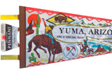 Vintage Yuma felt pennant detail: yellow tab, brown stitched border, and Western cowboy scene.