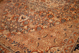 Close-up of the fine weave and soft blue striations in a collector-quality antique Tabriz rug.