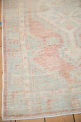Even wear to knot heads and the intact side cord on a distressed Oushak rug.
