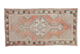 Distressed Oushak runner, geometric medallion in dusty blush, slate blue, ivory tones. 2'8