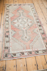 Distressed Oushak runner, geometric floral motif, heavy abrashes, dusty blush, silver, slate blue.