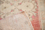 Hand-knotted foundation and secured side cord on the corner of a vintage Turkish Oushak rug.