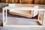 White maple sidecar shown with its detachable bottom frame separated.