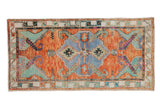 Vintage Oushak runner with shield medallion, serrated vines, rust, faded blue, and turquoise. 2'9