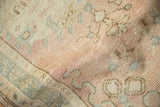 Distressed Oushak rug runner pile texture in dusty rose and pale coffee brown.