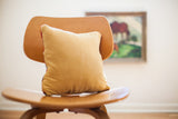 Soft mustard yellow velvet backing of the Red Persian Rug Pillow.