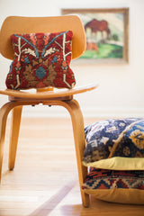 Unique Red Persian Rug Pillow, hand-knotted with stylized botanical and geometric motifs.