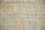 Even wear to the knot heads and soft color abrashes on a distressed Oushak rug.
