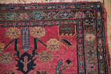 Vintage Mehreban runner: pale raspberry red field, vine finials, unusual natural border with abrashes.